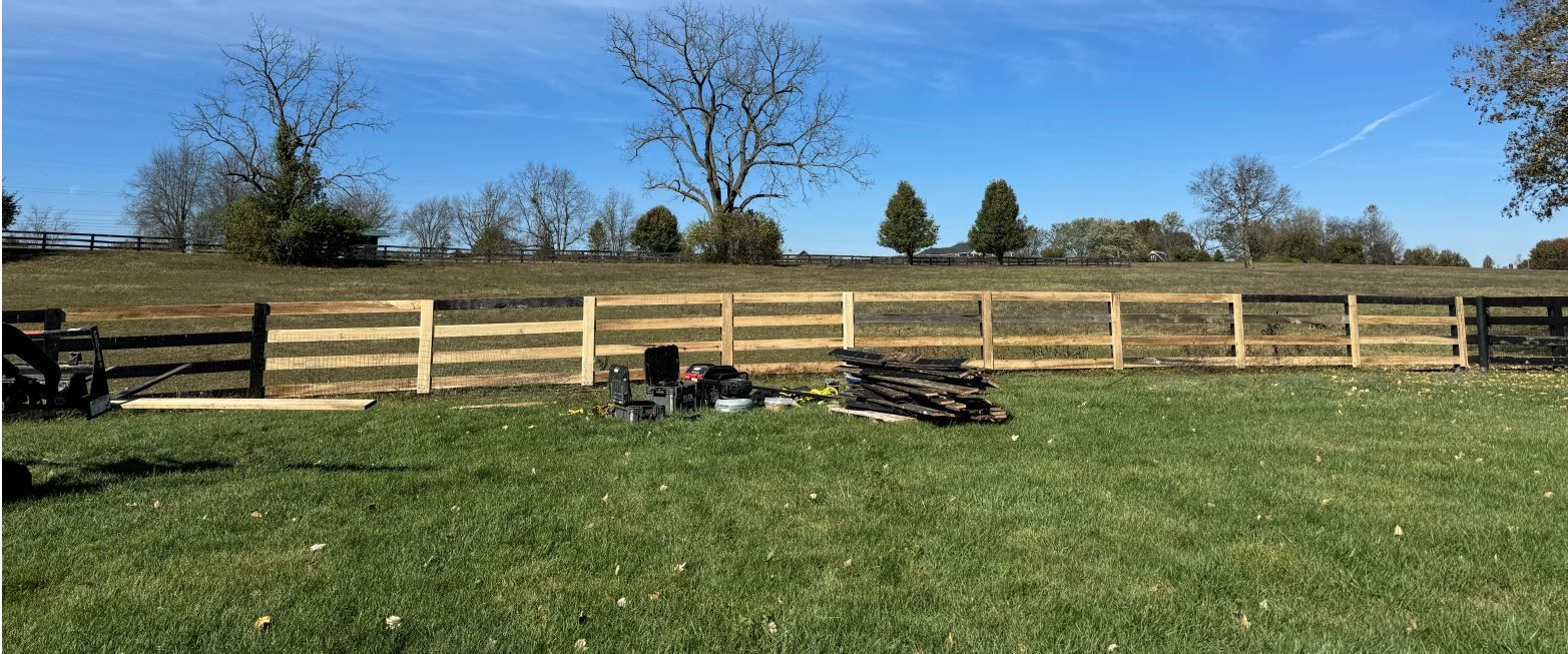 Fence repair contractor at work in Central Kentucky