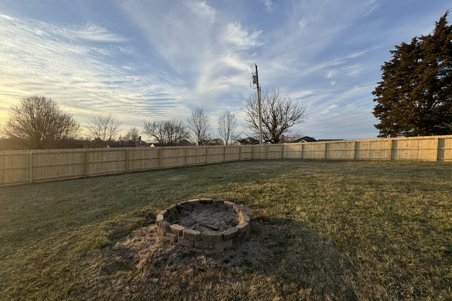 Wood privacy fence with fire pit area Central Kentucky